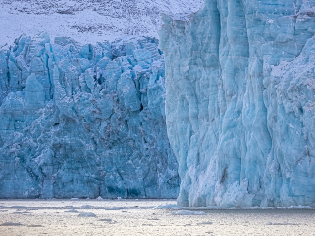 Photograph of uneven blue ice glacier fronts