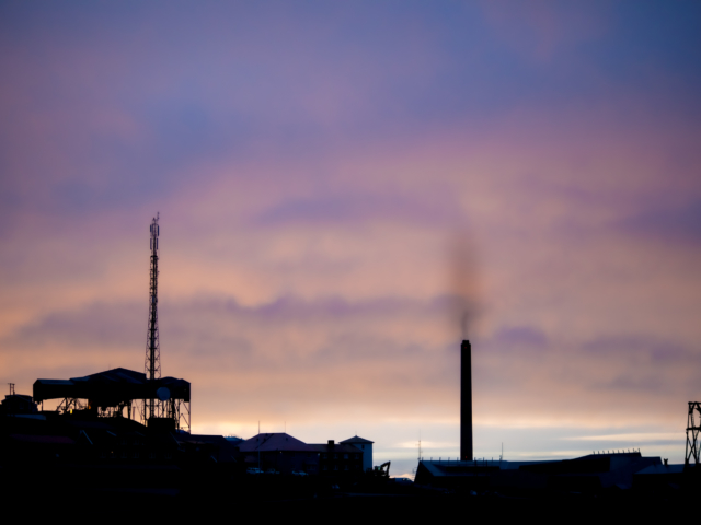 Silhuoettes of Arctic Life Black industrial silhouettes agains one of the last sunset skies.