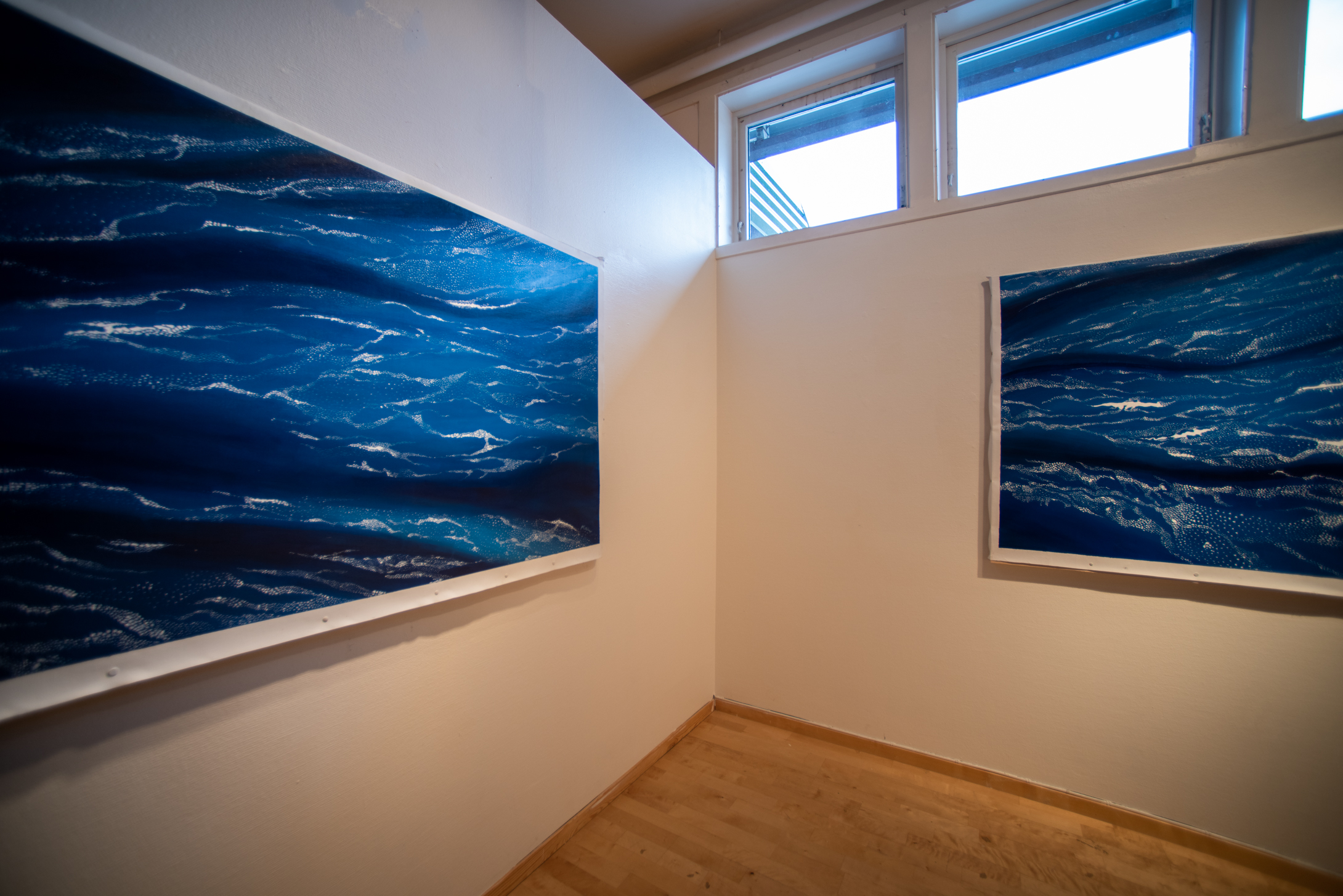 two blue drift ice paintings