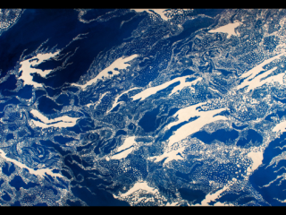 Section 3 of Loss and Change The painted drift ice beccomes thicker, and swirling much tighter as it approacher land