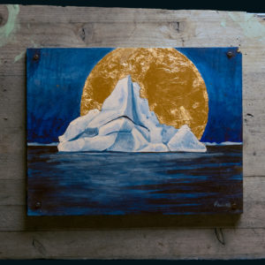 painting of an iceberg against a deep blue sea and sky with a large gold leave halo